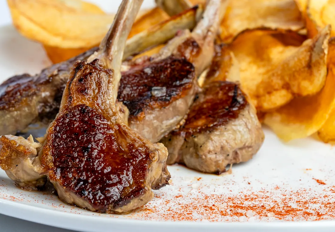 Chuletas de cordero — grilled lamb chops at Los Gallegos in Miami, Florida