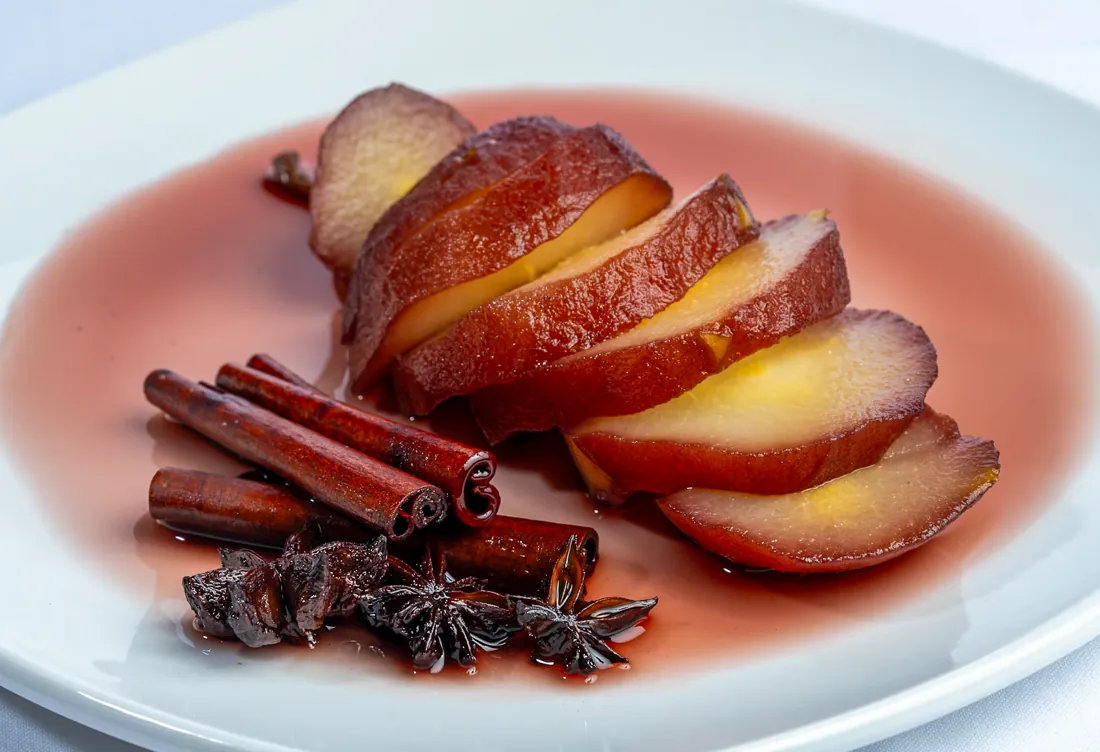 Peras al vino — pears poached in spiced red wine at Los Gallegos Miami